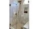 Modern shower with white tile, a glass door, and updated fixtures at 2193 Kildare Nw Way, Kennesaw, GA 30152