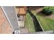 The backyard features green grass and a wooden deck, perfect for outdoor living at 3263 Mill Springs Circle Northeast Cir, Buford, GA 30519