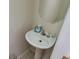 A charming bathroom featuring a pedestal sink and ample lighting at 3263 Mill Springs Circle Northeast Cir, Buford, GA 30519