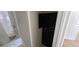 A full bathroom featuring a tub with a shower and a black storage cabinet at 3263 Mill Springs Circle Northeast Cir, Buford, GA 30519
