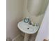 Simple bathroom with a pedestal sink at 3263 Mill Springs Circle Northeast Cir, Buford, GA 30519