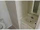 A vanity and mirror in the home's half bathroom at 3263 Mill Springs Circle Northeast Cir, Buford, GA 30519