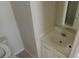 Small, but convenient, half bathroom with a vessel sink and mirror at 3263 Mill Springs Circle Northeast Cir, Buford, GA 30519