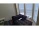Sunlit bedroom nook showcasing a daybed and view of window with blinds at 3263 Mill Springs Circle Northeast Cir, Buford, GA 30519