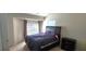 Bedroom with a large bed, natural light, and carpeting at 3263 Mill Springs Circle Northeast Cir, Buford, GA 30519