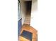 Entryway features wood floors, stairs to upper level, and access to other areas of the home at 3263 Mill Springs Circle Northeast Cir, Buford, GA 30519