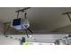 Garage door mechanism provides security and convenience for vehicle storage at 3263 Mill Springs Circle Northeast Cir, Buford, GA 30519