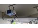 The garage's ceiling with the garage door opener at 3263 Mill Springs Circle Northeast Cir, Buford, GA 30519