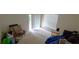 Spacious, sun-filled living room with sliding glass door and window at 3263 Mill Springs Circle Northeast Cir, Buford, GA 30519