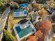Aerial view of community pool and tennis courts near surrounding neighborhood at 3275 Lord N Lady Ln, Alpharetta, GA 30022