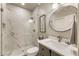 Modern bathroom with marble tiling, glass shower, and elegant vanity at 3275 Lord N Lady Ln, Alpharetta, GA 30022