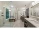 Modern bathroom with a glass-enclosed shower, double vanity, and sleek fixtures at 3275 Lord N Lady Ln, Alpharetta, GA 30022