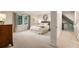 Spacious bedroom featuring a large window, neutral walls and carpet, and an ensuite bathroom at 3275 Lord N Lady Ln, Alpharetta, GA 30022