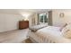 Cozy bedroom featuring a dresser, side ladder and a view of the green backyard at 3275 Lord N Lady Ln, Alpharetta, GA 30022