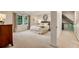 This cozy bedroom features soft colors, great natural light, and an attached living space at 3275 Lord N Lady Ln, Alpharetta, GA 30022