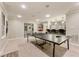 Basement game room featuring a ping pong table and a dining space at 3275 Lord N Lady Ln, Alpharetta, GA 30022