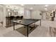 Game room featuring a ping pong table and a wet bar at 3275 Lord N Lady Ln, Alpharetta, GA 30022
