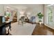 Elegant living room with hardwood floors, stylish furnishings, and views to the dining room at 3275 Lord N Lady Ln, Alpharetta, GA 30022