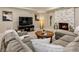 Inviting living room featuring a fireplace, recessed lighting, and comfortable seating at 3275 Lord N Lady Ln, Alpharetta, GA 30022