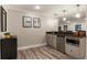 Finished basement wet bar area with a sink, microwave and dishwasher at 3275 Lord N Lady Ln, Alpharetta, GA 30022