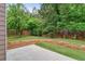 Backyard featuring a lawn and wood fence at 4515 Ambassador Way, Cumming, GA 30040