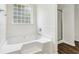 Bright bathroom featuring a tub and separate shower at 4515 Ambassador Way, Cumming, GA 30040