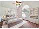 Staged bedroom with window and minimalist decor at 4515 Ambassador Way, Cumming, GA 30040