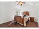 Spacious bedroom features wood floors, vaulted ceilings, and a ceiling fan at 4515 Ambassador Way, Cumming, GA 30040