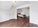 Bright bedroom with wood floors and vaulted ceilings offers an open layout at 4515 Ambassador Way, Cumming, GA 30040