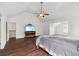 Bright bedroom with vaulted ceilings, wood floors, and space for entertainment at 4515 Ambassador Way, Cumming, GA 30040