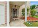 Welcoming front porch with brick facade, manicured landscaping, and a charming entryway at 4515 Ambassador Way, Cumming, GA 30040