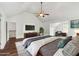 Spacious main bedroom with vaulted ceiling and hardwood floors at 4515 Ambassador Way, Cumming, GA 30040