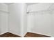 Walk-in closet with carpet flooring and shelving provides ample storage space at 4515 Ambassador Way, Cumming, GA 30040