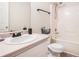 Bathroom featuring a tub, shower, single sink vanity, and dark hardware at 4578 Score Ct, Snellville, GA 30039