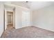 Bedroom with carpet and double-door closet at 4578 Score Ct, Snellville, GA 30039