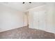 Bright, spacious bedroom features neutral carpet, vaulted ceilings, and ample closet space at 4578 Score Ct, Snellville, GA 30039