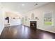 Living room with dark hardwood floors and a gas fireplace at 4578 Score Ct, Snellville, GA 30039