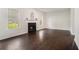 Spacious living room featuring a fireplace and hardwood flooring at 4578 Score Ct, Snellville, GA 30039