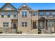 Attractive townhome exteriors with stone accents and welcoming front entrances at 178 Munira Sw Ln, Atlanta, GA 30331