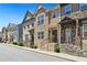 Charming townhome exteriors with stone accents, inviting front porches, and well-maintained landscaping at 178 Munira Sw Ln, Atlanta, GA 30331