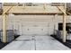Spacious two-car garage with additional outdoor parking at 178 Munira Sw Ln, Atlanta, GA 30331