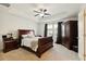 Main bedroom features tray ceiling, neutral carpet, and black-out curtains at 178 Munira Sw Ln, Atlanta, GA 30331