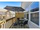 Outdoor patio seating area with an umbrella for shade at 178 Munira Sw Ln, Atlanta, GA 30331