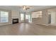 Inviting living room boasts modern flooring, a cozy fireplace, and an open floor plan at 2907 Timbercreek Cir, Roswell, GA 30076