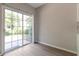 Bright living room with sliding glass doors leading to the outdoor space at 2907 Timbercreek Cir, Roswell, GA 30076