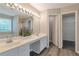 Bright main bathroom features dual sinks, vanity area and walk in closet access at 2907 Timbercreek Cir, Roswell, GA 30076