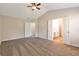 Large main bedroom boasts a ceiling fan and ensuite bathroom access at 2907 Timbercreek Cir, Roswell, GA 30076