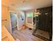 Modern bathroom with tiled floors, a glass-enclosed shower, and sleek fixtures at 3240 Columbia Oaks Way, Decatur, GA 30032