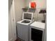 Laundry room with new side-by-side washer and dryer at 3240 Columbia Oaks Way, Decatur, GA 30032