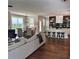 Open-concept living space with a modern kitchen, dining area, and comfortable seating, perfect for entertaining at 3240 Columbia Oaks Way, Decatur, GA 30032